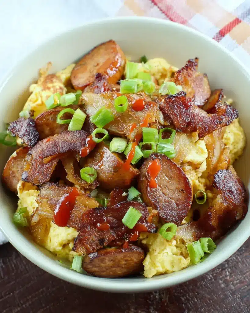 Breakfast Gumbo – Southern Grits Bowl with Sausage & Eggs 8 Scrambled eggs topped with crispy bacon, sausage, green onions in a breakfast gumbo bowl