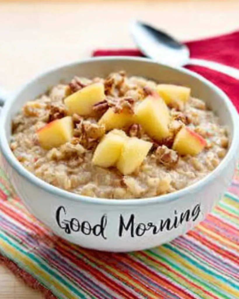 Oatmeal Apple Breakfast Bake – Cozy, Customizable & Meal Prep Friendly 8 Bowl of oatmeal apple topped with chopped nuts and fresh apples, served in a white “Good Morning” bowl