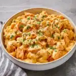 Buffalo chicken mac and cheese with creamy sauce and baked chicken pieces