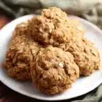 Soft Pumpkin Oatmeal Cookies – The Perfect Fall Treat 11 Soft pumpkin oatmeal cookies with chewy texture and visible oats served on a white plate
