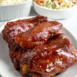Slow Cooker Country Style Ribs – Tender & Flavorful Comfort Food 14 Slow cooker country style ribs glazed in BBQ sauce with mashed potatoes and coleslaw on the side