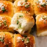 Garlic Butter Bread Rolls Recipe : Soft, Fluffy, and Perfect for Thanksgiving 10 Golden garlic butter bread rolls with parsley on top