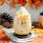 Pumpkin Spice White Russian Recipe | A Festive Fall Cocktail 11 Pumpkin Spice White Russian with whipped cream and golden sugar rim