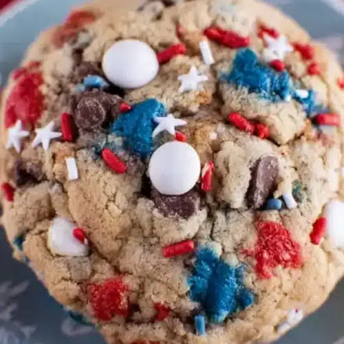 Soft 4th of July cookies with red white and blue candies and sprinkles