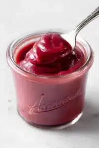Easy rhubarb butter in jar with smooth glossy texture