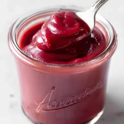 Easy rhubarb butter in jar with smooth glossy texture