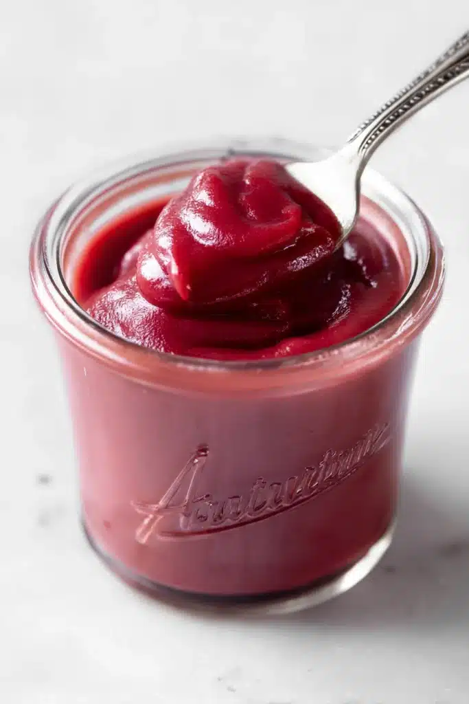 Easy rhubarb butter in jar with smooth glossy texture