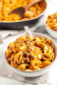 Creamy homemade hamburger helper with tender pasta and rich cheesy beef sauce. This cozy one-pot meal looks indulgent, comforting, and perfect for easy family dinners.