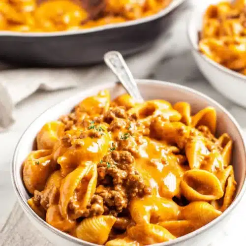 Creamy homemade hamburger helper with tender pasta and rich cheesy beef sauce. This cozy one-pot meal looks indulgent, comforting, and perfect for easy family dinners.