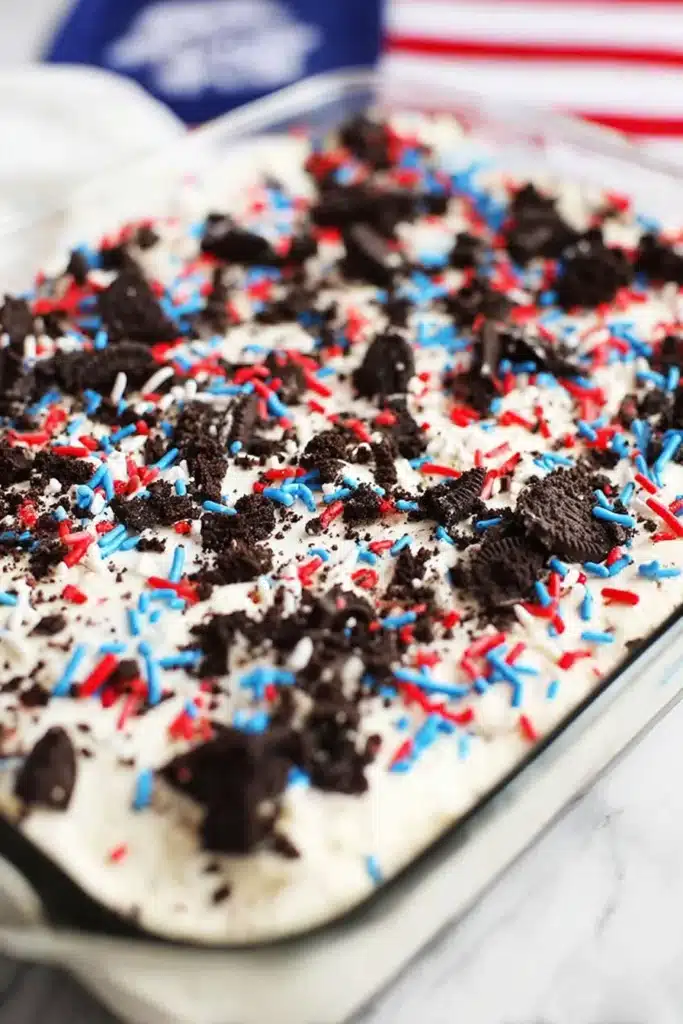 No Bake Fireworks Oreo Cheesecake Bars with Oreo topping and sprinkles