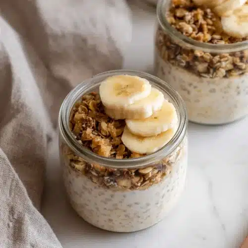 Brown Sugar Overnight Oats Recipe for Easy Breakfast 4 Brown sugar overnight oats with banana slices and granola in jars