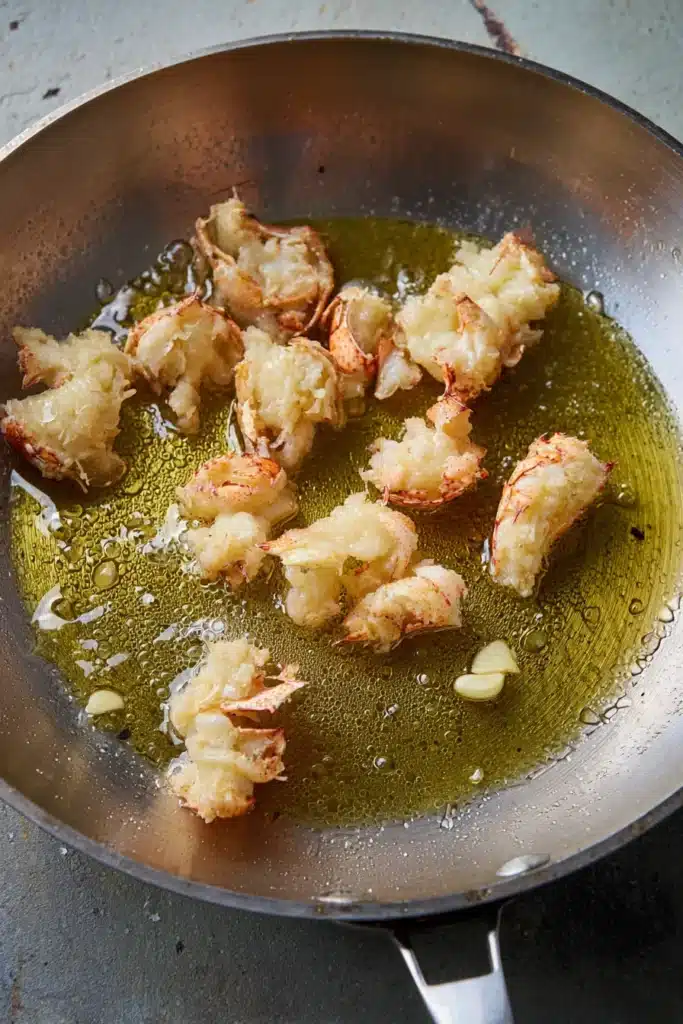 Buttered Lobster Pasta 2 Buttered Lobster Pasta lobster cooking in buttery skillet