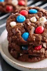 Chewy Patriotic Brownie Cookies with chocolate chips and red white blue candies