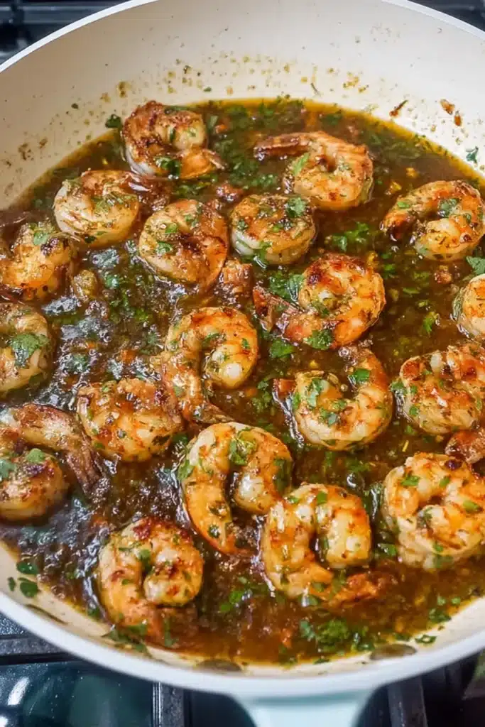 Cilantro Lime Shrimp Tacos shrimp cooking in buttery lime cilantro sauce