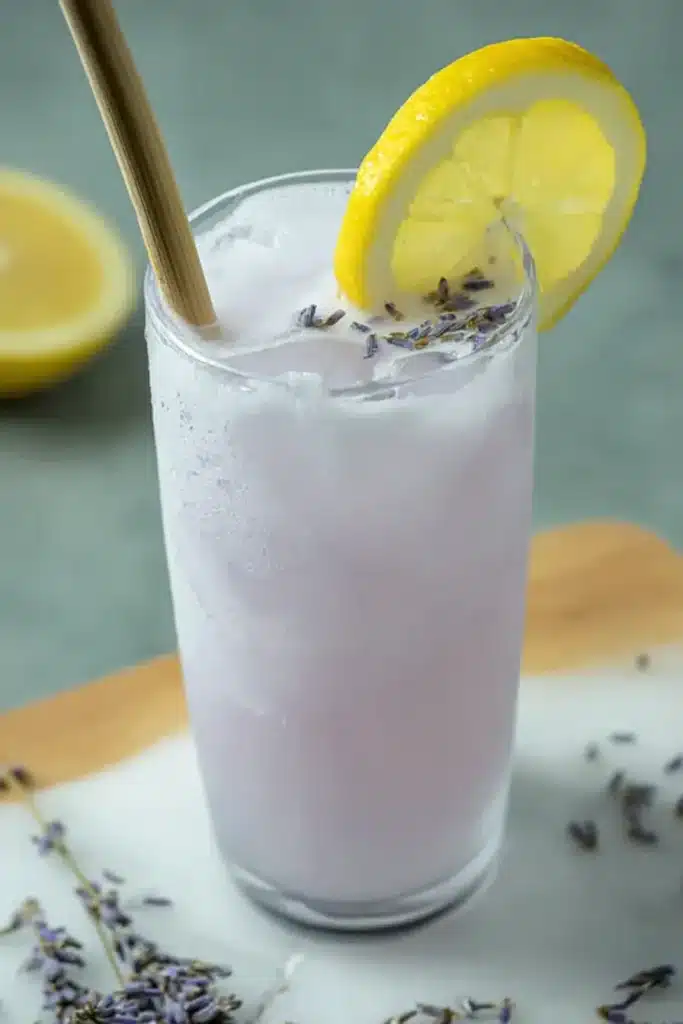 Coconut Lavender Lemonade Mocktail 1 Coconut Lavender Lemonade Mocktail served over ice with lemon garnish
