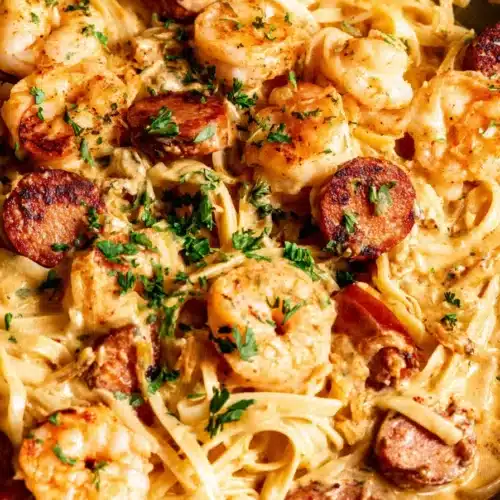 Creamy Cajun shrimp pasta with sausage, linguine, and rich spicy cream sauce