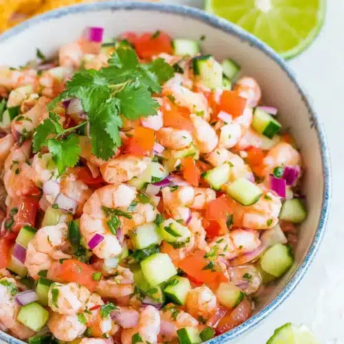 Fresh shrimp ceviche with cucumber, tomatoes, cilantro, and tortilla chips